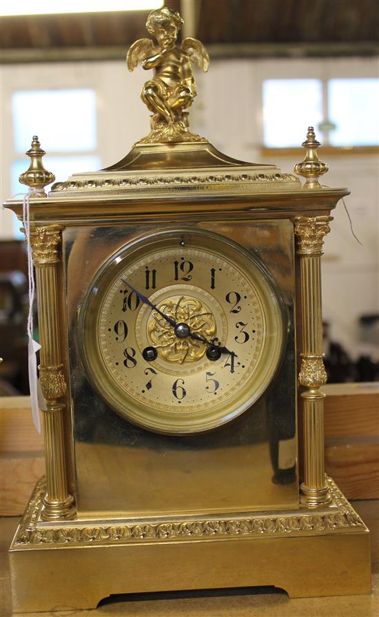 Cherub mounted bracket clock